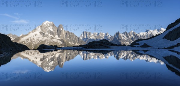Mountain landscape in the evening light, water reflection in Lac Blanc, mountain peak, Aiguille