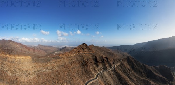 Mountain road at the Degollade de las Yeguas viewpoint with a view of the Barranco de Fataga, Gran