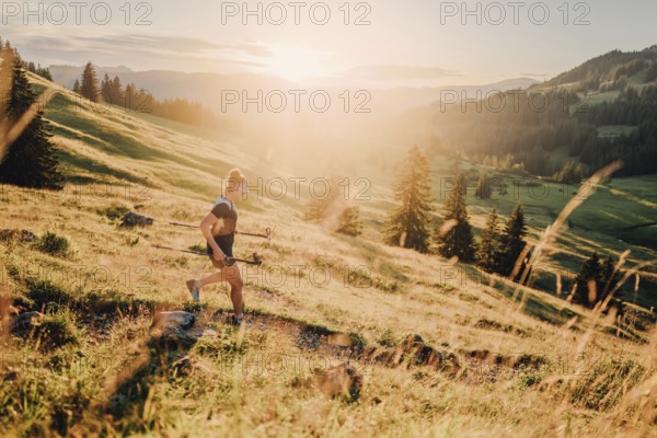 Summer trail running and hiking in the Alps on the Riedberg Pass between Obermaiselstein and