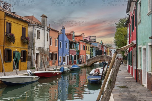 Colorful Houses in Burano beneath a scenic sky, Island of Venice, Italy, Europe
