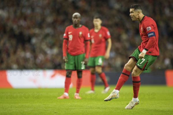Football match, captain Cristiano RONALDO CR7 Portugal shoots the free kick with his right foot and