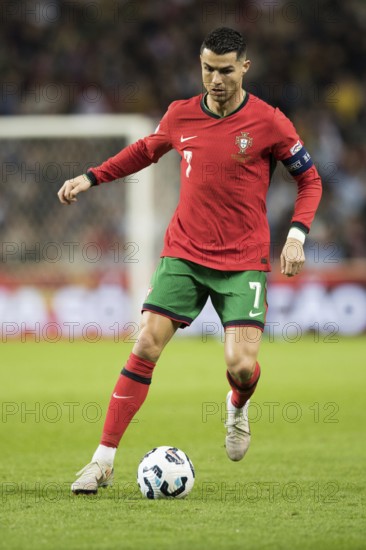 Football match, captain Cristiano RONALDO CR7 Portugal with the ball between both legs, the right