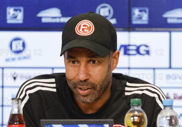 Football match, coach Daniel THIOUNE Fortuna Düsseldorf portrait smiling at the press conference,