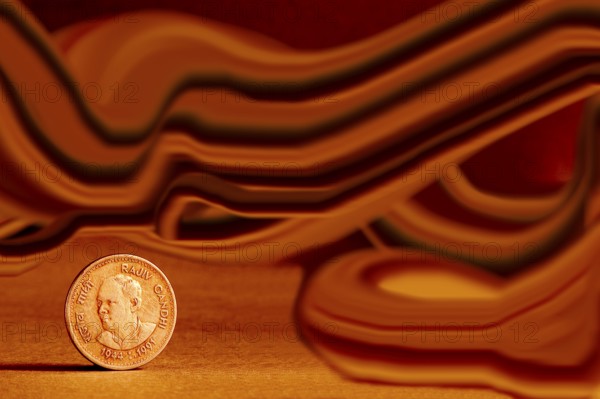 One single Indian currency one rupees coin and artistic background backside embossed Rajiv Gandhi