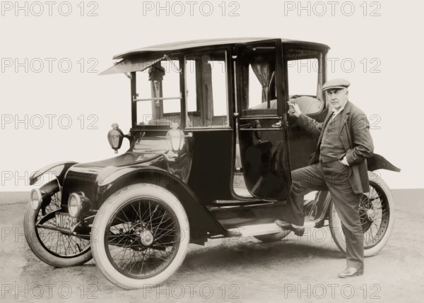 Thomas Alva Edison, 1847, 1931, American inventor, with Detroit Electric automobile, 1913,