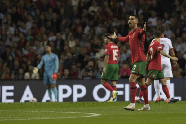 Football match, captain Cristiano RONALDO CR7 Portugal right with both arms pointing upwards so it