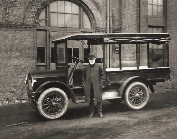 Thomas Alva Edison inspecting a Lansden Electric truck which used Edison batteries, digitally