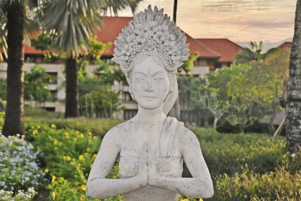 Traditional balinese statue in a public park. Bali, Indonesia, Asia