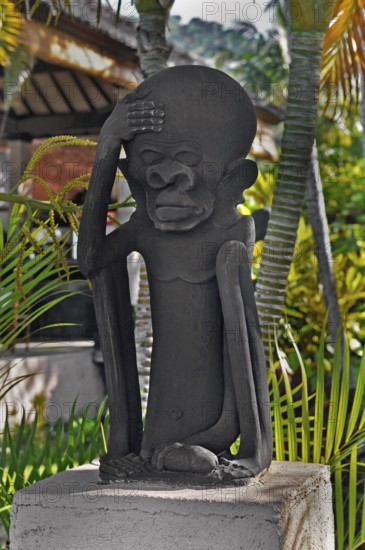 Scurrilous figure, large head and giant penis, near Amed, Bali, Indonesia, Asia