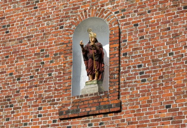 St. Nikolai on the church façade in Altenbruch, district of the medium-sized town of Cuxhaven