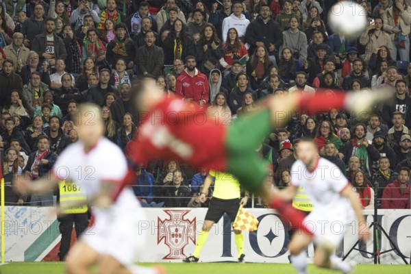 Football match, captain Cristiano RONALDO CR7 Portugal centre in acrobatic pull-back position out