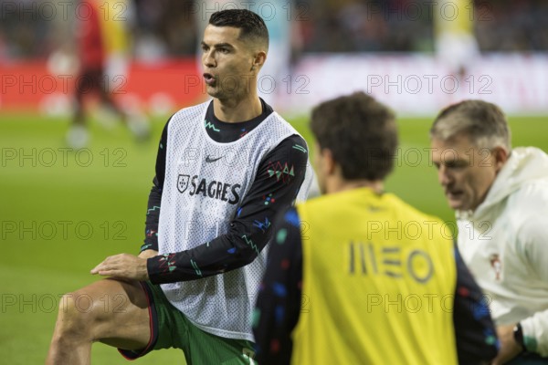 Football match, Cristiano RONALDO CR7 Portugal kneeling during pre-match warm-up with slightly open