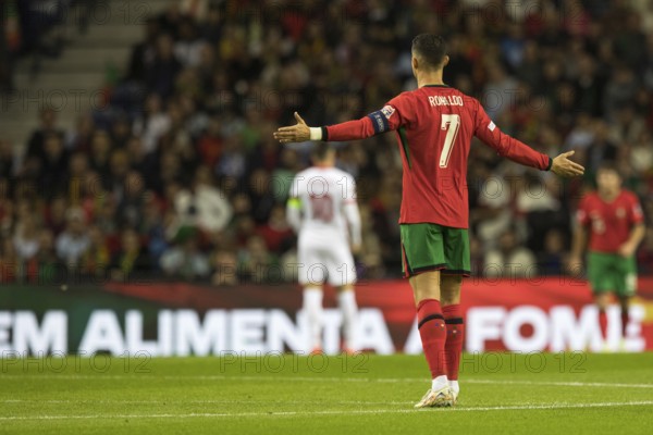Football match, captain Cristiano RONALDO CR7 Portugal with raised arms looking from behind with