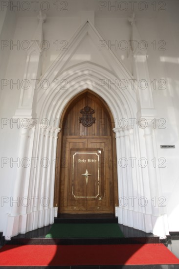 Main door of Bible tower at the rear of Shrine Basilica of Our Lady of Dolours built in1940,