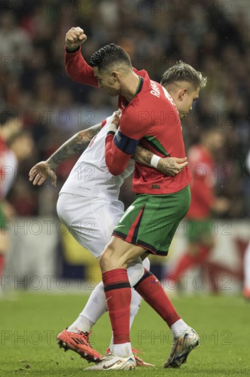 Football match, captain Cristiano RONALDO CR7 Portugal right, looking from behind in a duel with