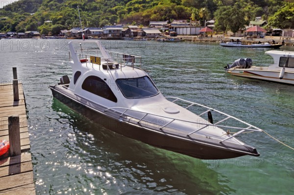Police speedboat at the jetty, Labuan Bajo, Flores Island, Indonesia, Asia