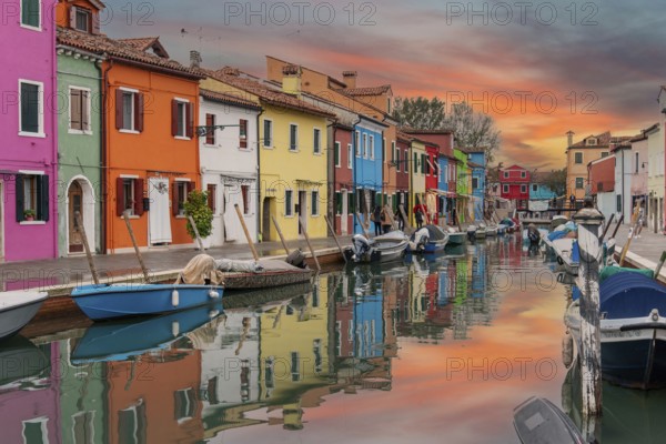 Colorful Houses in Burano beneath a scenic sky, Island of Venice, Italy, Europe