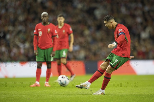 Football match, captain Cristiano RONALDO CR7 Portugal shoots the free kick with his right foot,
