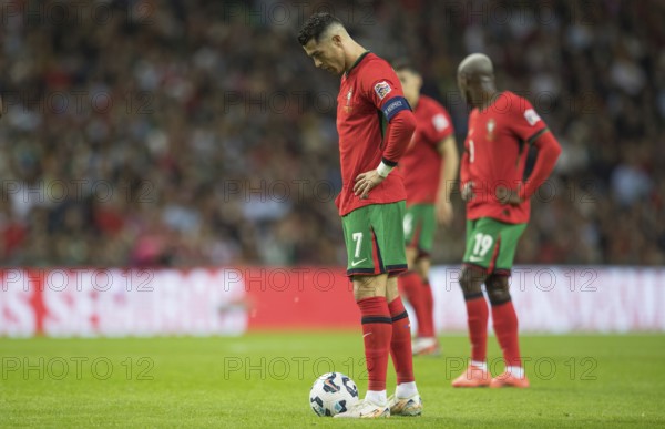 Football match, Cristiano RONALDO CR7 Portugal stands in front of the ball looking down with his
