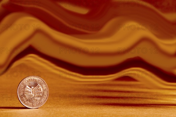 One single Indian currency one rupees coin and artistic background backside embossed Cellular Jail