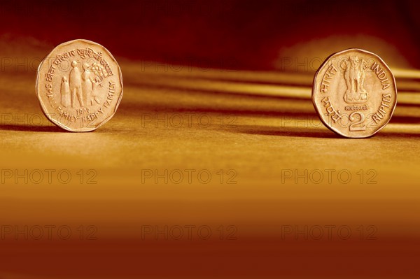 Double pair Indian currency two rupees coin front side and backside manner embossed small happy