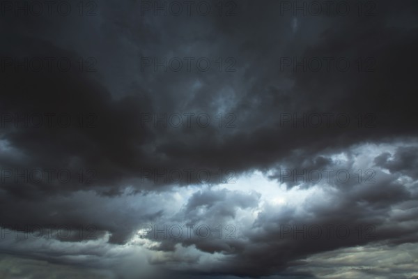 Stormy clouds gray low key sky with dramatic shadows and lights