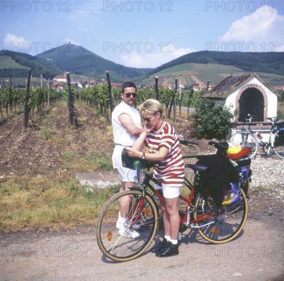 A bike ride through the Alsace, here on 11.05.1994 near Kayserberg, on a vineyard route is not only