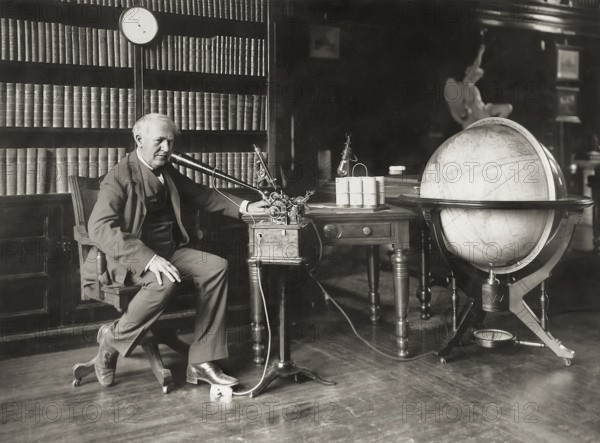 Thomas Alva Edison talking into the business phonograph or ediphone, digitally edited