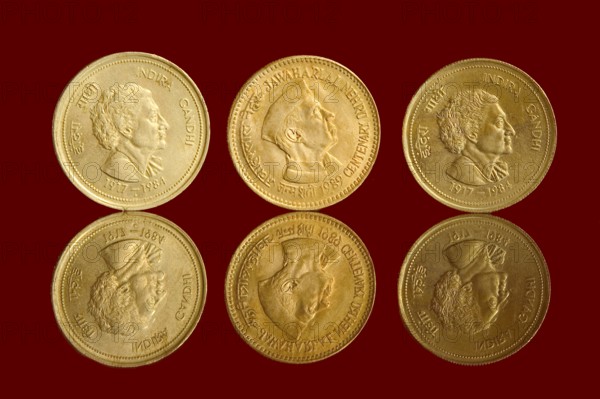 Three Indian currency five rupees coins with reflection backside embossed in middle Jawaharlal