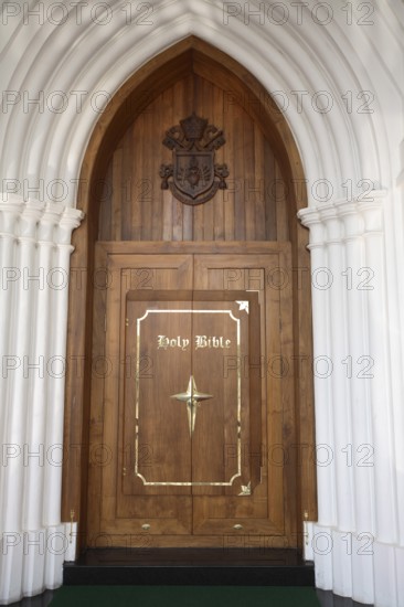 Main door of Bible tower at the rear of Shrine Basilica of Our Lady of Dolours built in1940,