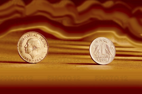 Double pair Indian currency one rupees coin and artistic background front side and backside manner