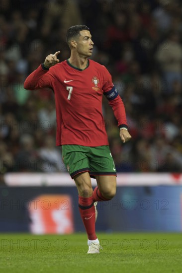 Football match, captain Cristiano RONALDO CR7 Portugal running and pointing with his arm and index