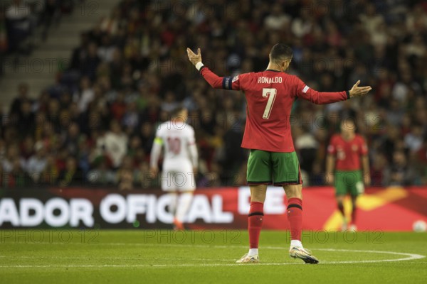 Football match, captain Cristiano RONALDO CR7 Portugal with raised arms I can't change it looking