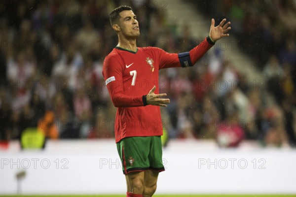 Football match, captain Cristiano RONALDO CR7 Portugal protests energetically and angrily with