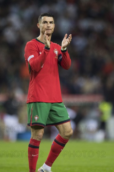 Football match, captain Cristiano RONALDO CR7 Portugal claps his hands and looks into the crowd,