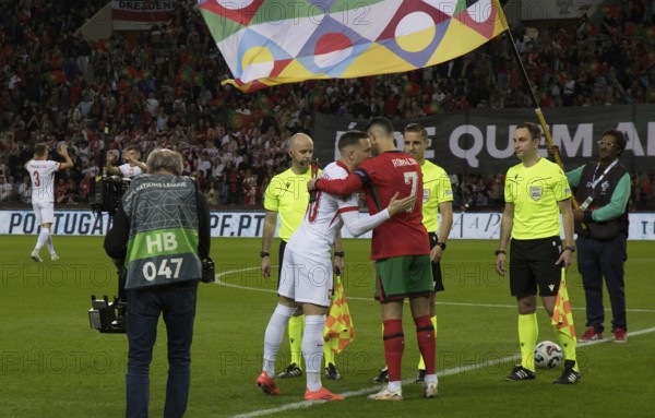 Football match, Cristiano RONALDO CR7 Portugal r. hugs Piotr ZIELINSKI Poland at the place