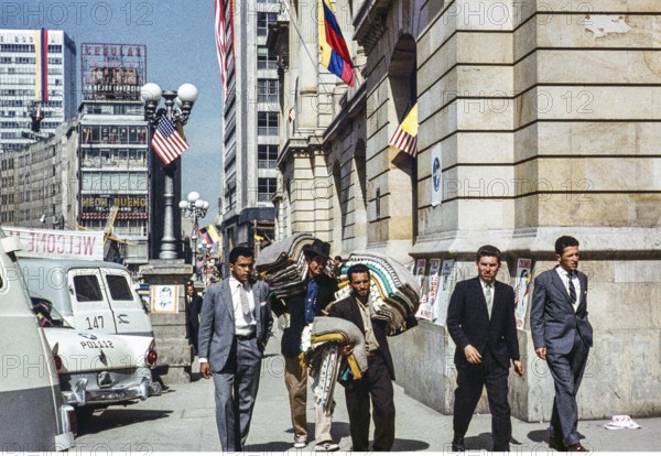 Street in the city centre on the day of President Kennedy's visit, Bogota, Colombia, South America,