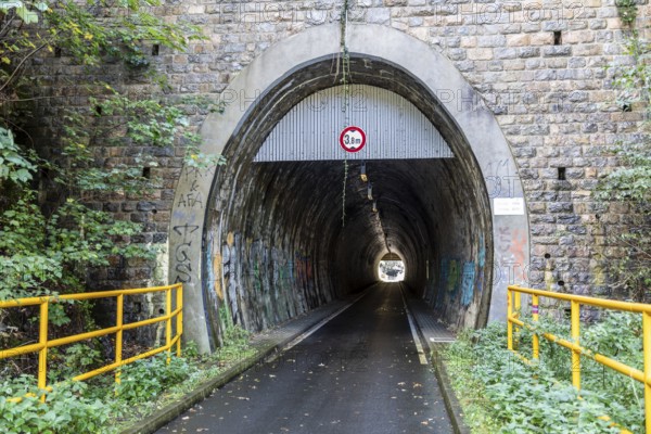 The Chemnitz Valley cycle path leads through the Schusterstein Tunnel, an old railway tunnel,