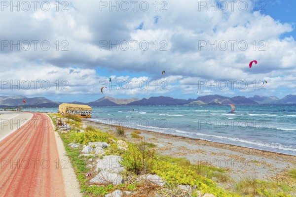 Group of people kitesurfing, Alcudia, Mallorca, Balearic Islands, Spain, Europe