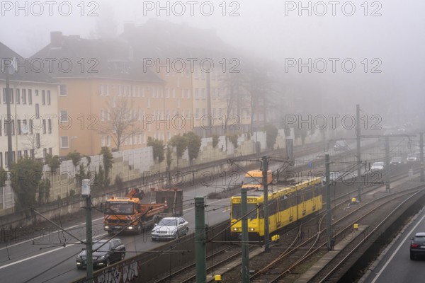 Dense fog, with visibility sometimes less than 100 metres, A40 motorway, city passage in Essen,