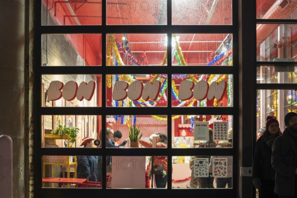 Detroit, Michigan - People buy chocolates at the Bon Bon Bon store on Noel Night. The annual Noel