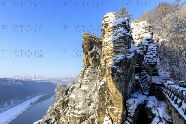 View from the Bastei Bridge into the Elbe Valley and to the floating viewing platform of the Bastei