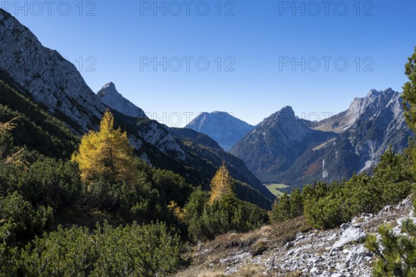 Mountain landscape in autumn, view of the Leutasch valley with mountain peak of the Wetterstein