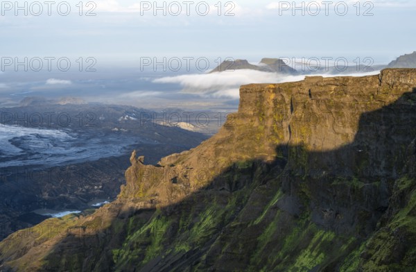 Cliff in the evening light, Impressive landscape with mountains and glaciers, Huldujökull and