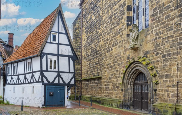 Wind hole narrow house next to Martinikirche Minden Germany
