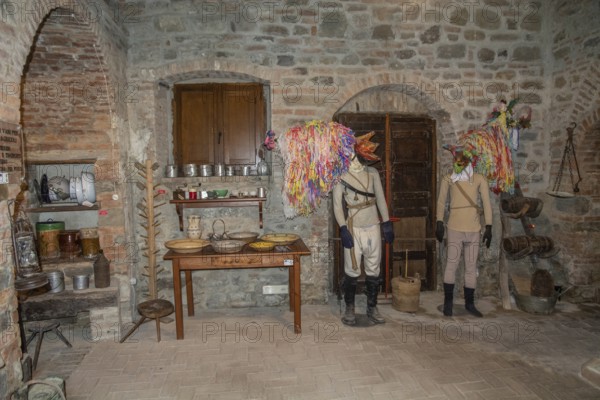 Interior with folk costumes in museum in Aliano, the very poor village in southern Italy that the