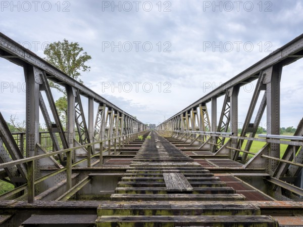 Abandoned railway bridge over the Elbe near Barby, lost place, steel truss bridge from the 1870s on
