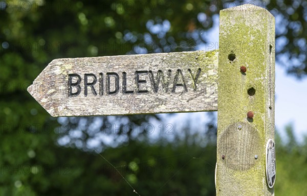 Close up wooden bridleway sign direction arrow pointer, Sutton, Suffolk, England, UK