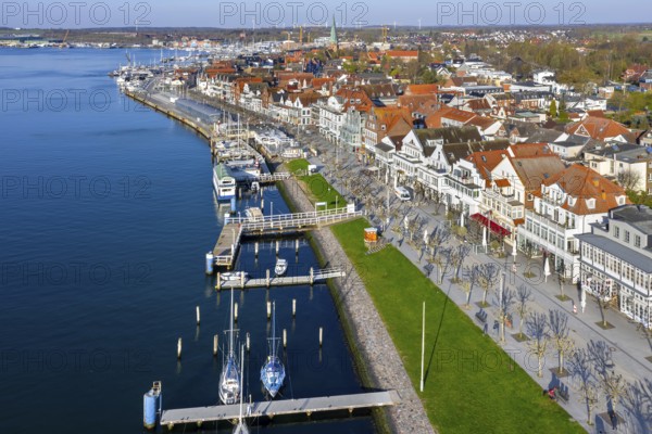 View over shops and restaurants along picturesque Vorderreihe at seaside resort Travemünde,