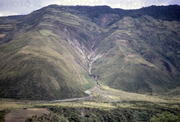 Andean mountain river valley with alluvial fan, near Baños de Agua Santa, Ecuador, Tungurahua